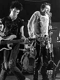 Sid Vicious and Johnny Rotten on stage with the Sex Pistols